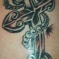 Black cross with beads tattoo