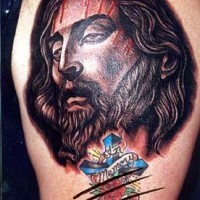 Qualitative jesus with cross tattoo