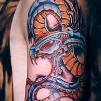 Impressive biomech snake artwork tattoo