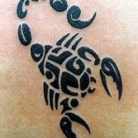 Tribal black scorpion tattoo