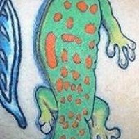 Green dotted amphibia tattoo