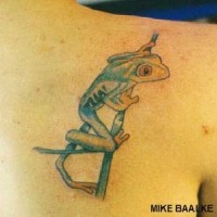 Small frog on branch tattoo