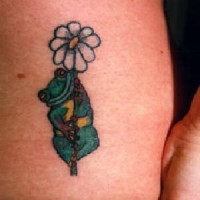 Cute frog on flower coloured tattoo