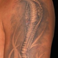 Realistic black cobra tattoo