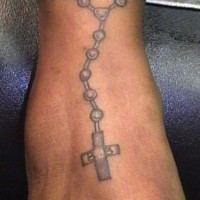 Rosary tattoo on ankle