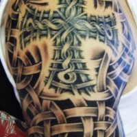 Shoulder arm tattoo, tangled, braided cross