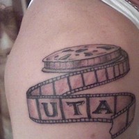 Shoulder tattoo, uta,black and white cine film
