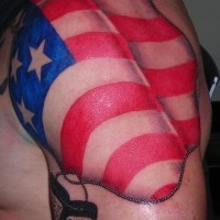 Shoulder tattoo, bright usa flag with trinket