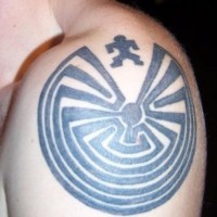 Shoulder tattoo, man near big labyrinth