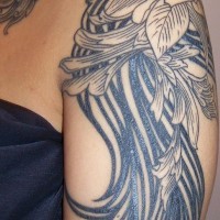 Shoulder tattoo, big black flower, designed with long leaves as tail