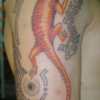 Shoulder tattoo, long orange lizard, styled