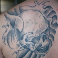 Shoulder tattoo, awful,black and white  crying skull
