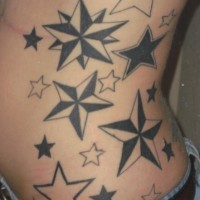 Side tattoo, different styled, volumetris stars