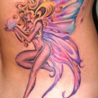 Side tattoo, blond, charming fairy with pearl