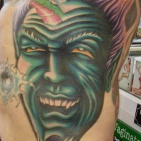 Side tattoo, green, dreadful, laughing, horned  monster
