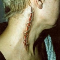 Skin rip stitches on neck tattoo