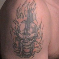 Flaming skull warrior  tattoo
