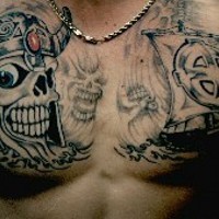 Skull in warrior helmet tattoo