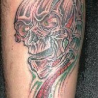 Biomech skull coloured tattoo