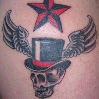 Skull with wings and nautical star tattoo