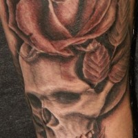Realistic skull and rose tattoo