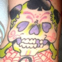 Sugar skull with suites tattoo