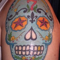 Colourful sugar skull tattoo