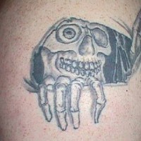 Skeleton looking from skin rip tattoo