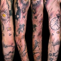 Flower and war sleeve tattoo