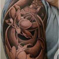 Awesome black lotus themed sleeve tattoo