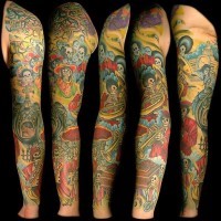 Dia de muertos themed sleeve tattoo