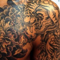 Tiger black ink sleeve tattoo