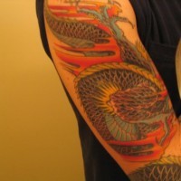 Asian dragon sleeve tattoo