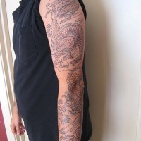 Undone asian dragon sleeve tattoo