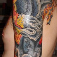 Black dragon sleeve tattoo