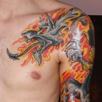 Black dragon in red flames tattoo