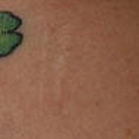 Small four leaf clover tattoo