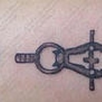 Small black ink compass tattoo