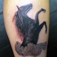 Realistic black horse in clouds tattoo