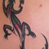 Coloured tribal lizard tattoo