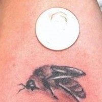 Small realistic bee  tattoo