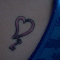 Heart symbol with key tattoo