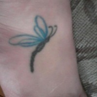 Small coloured dragonfly tattoo