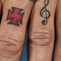 Maltese cross and musical note tattoo