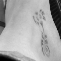 Small dandelion tattoo on foot