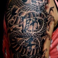 Black snake in sea tattoo