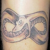 Snake eating own tail tattoo