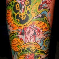 Poisonous snake with dagger tattoo