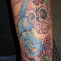 Sugar skull and blue snake tattoo