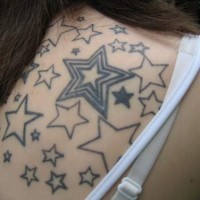 Bunch of stars tattoo on shoulder